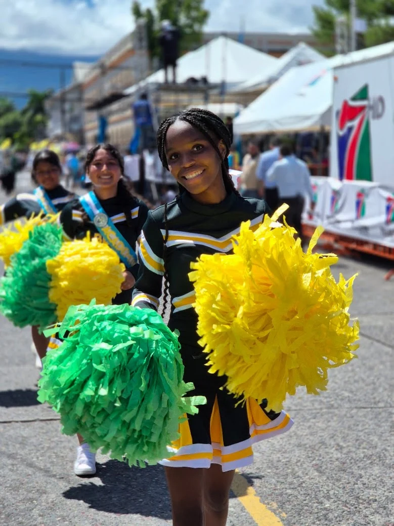 Brassavola cheerleader during a civic presentation