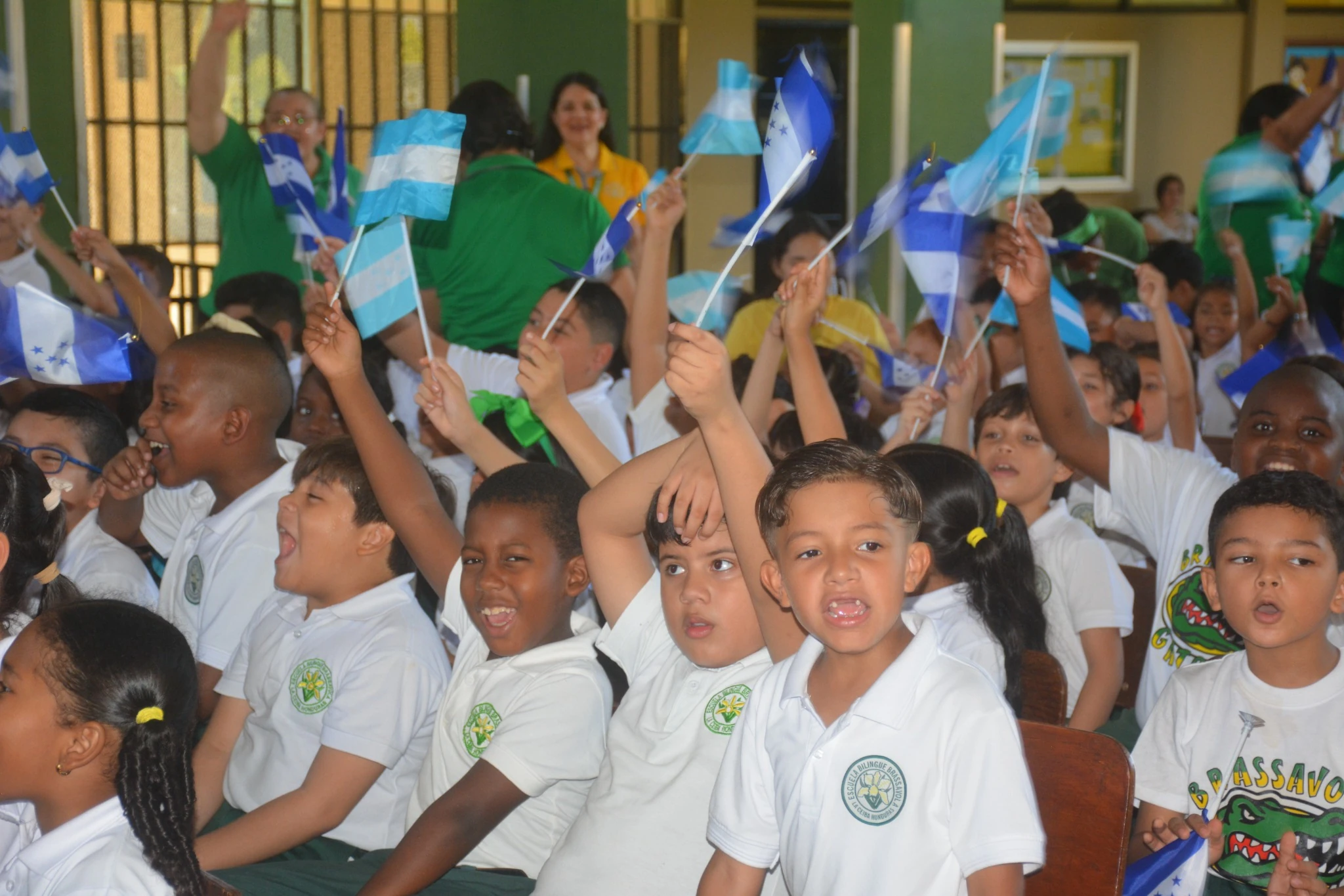 Students celebrating with flags during the event
