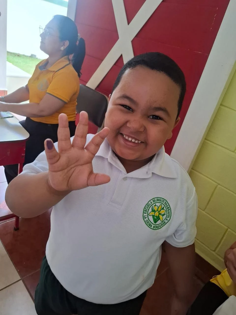 Estudiante de preescolar en Brassavola